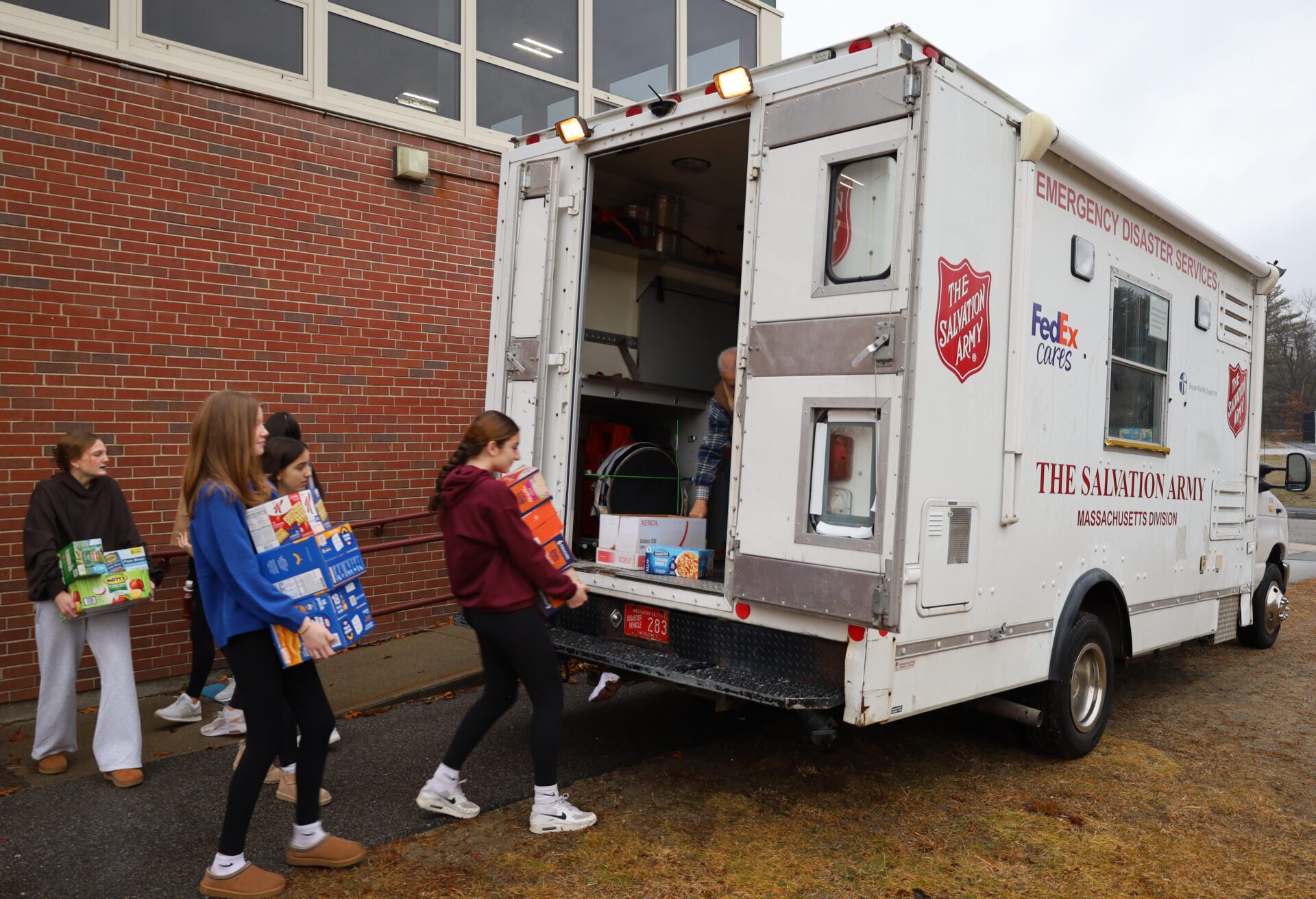 McCarthy Middle School students help load Project 300 donations onto the Salvation Army truck on Thursday, January 15, 2026.