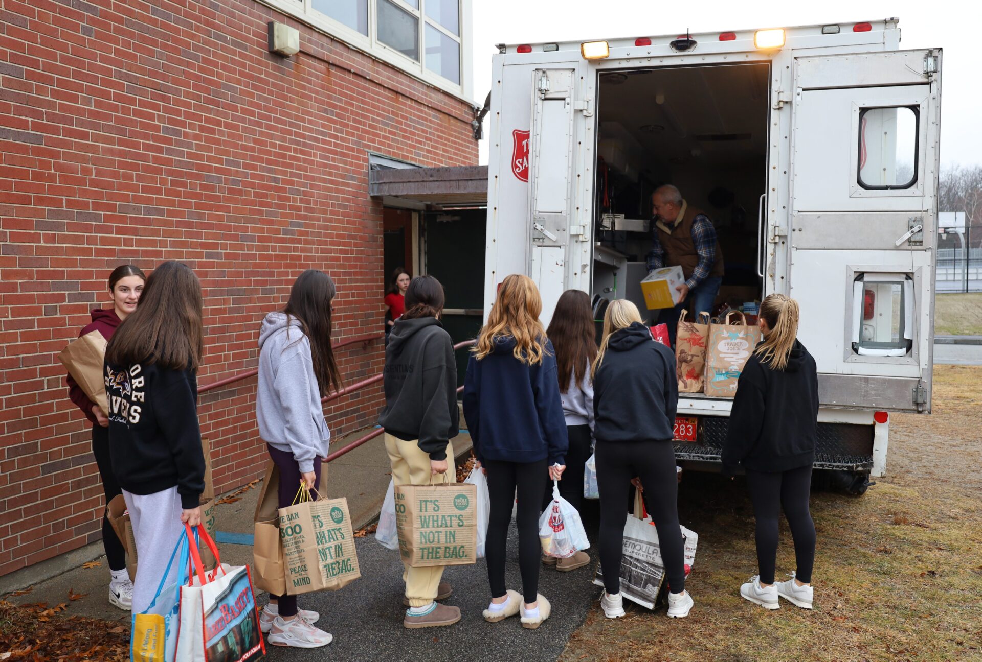 McCarthy Middle School students help load Project 300 donations onto the Salvation Army truck on Thursday, January 15, 2026.